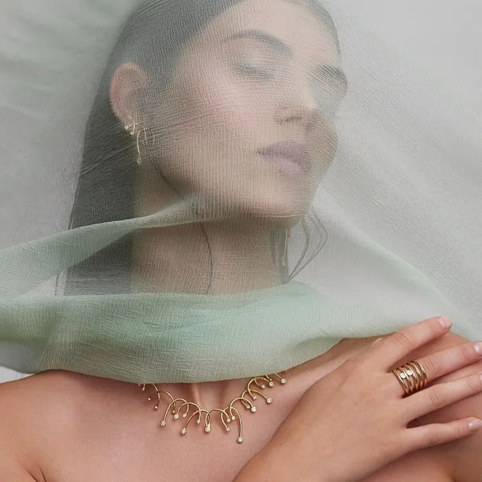 Anillo multiaros Marina García de plata con circonitas y baño dorado 91047SD